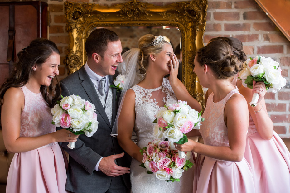 Bride and Bridesmaids Laughing