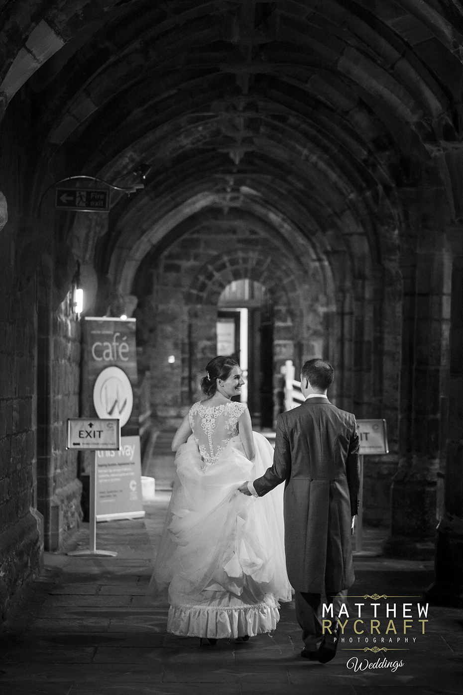 Bride Walking Groom Holding Dress