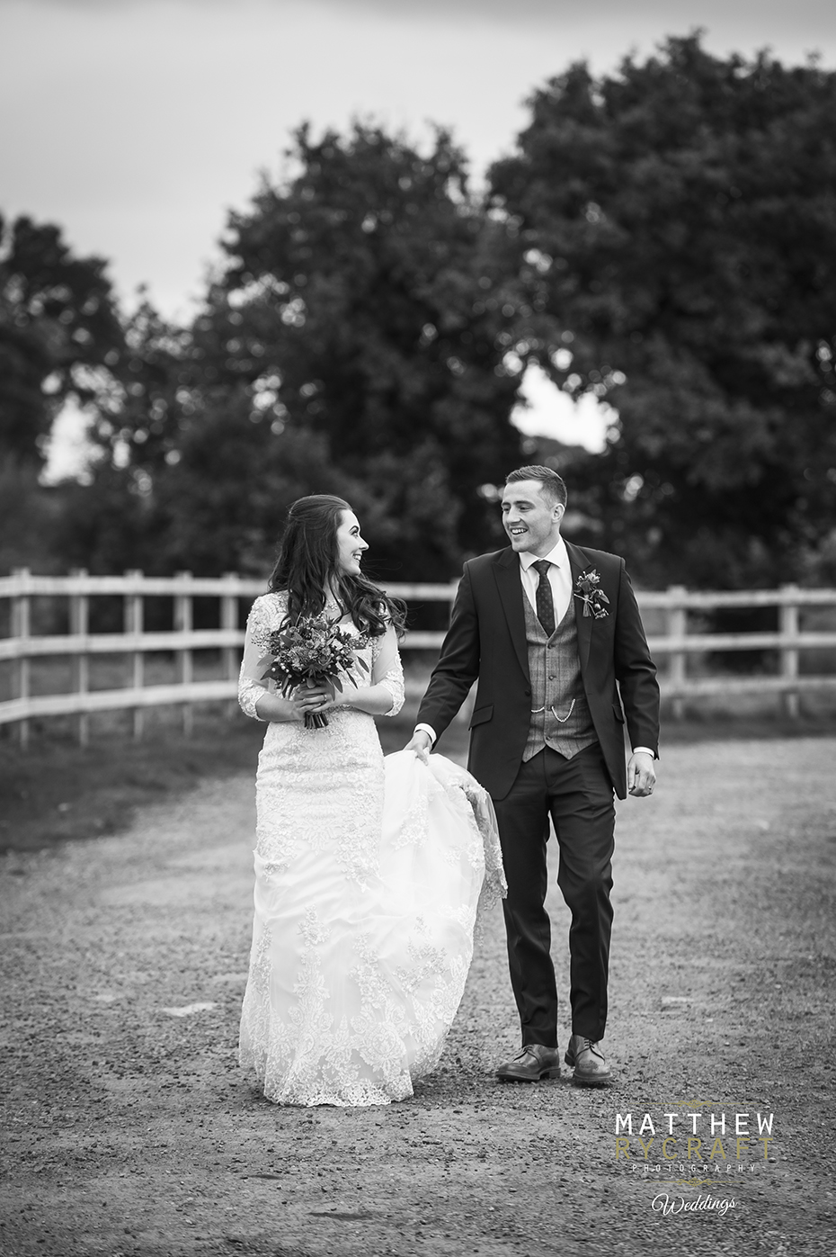 Bride and Groom Walking Wedding Photograph