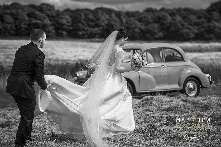 groom Carrying Wedding dress