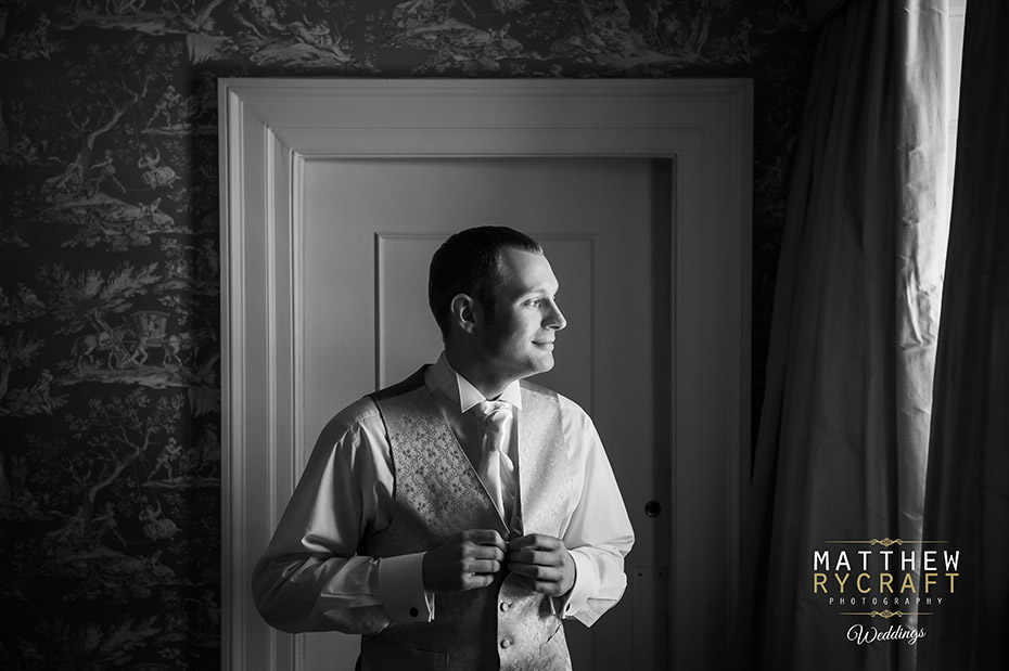 Groom getting ready morning wedding