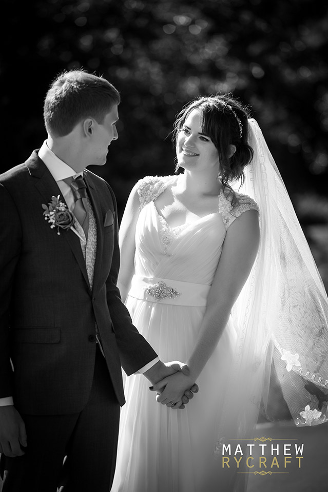 Bride and Groom Walking Holding Hands